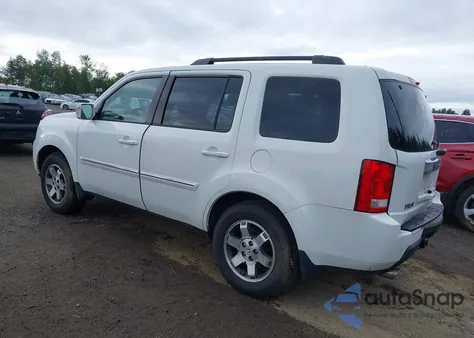 2010 Honda Pilot Touring z USA, uszkodzony, nr VIN 5FNYF4H92AB031653